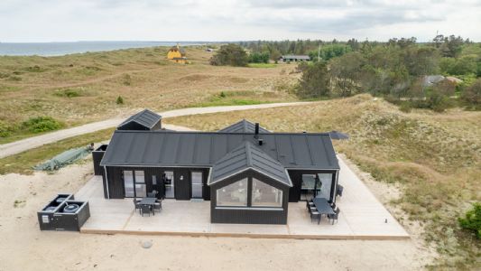 Skagensol - splinternyt sommerhus 8 prs - 150 m til en af Danmarks bedste badestrande. 